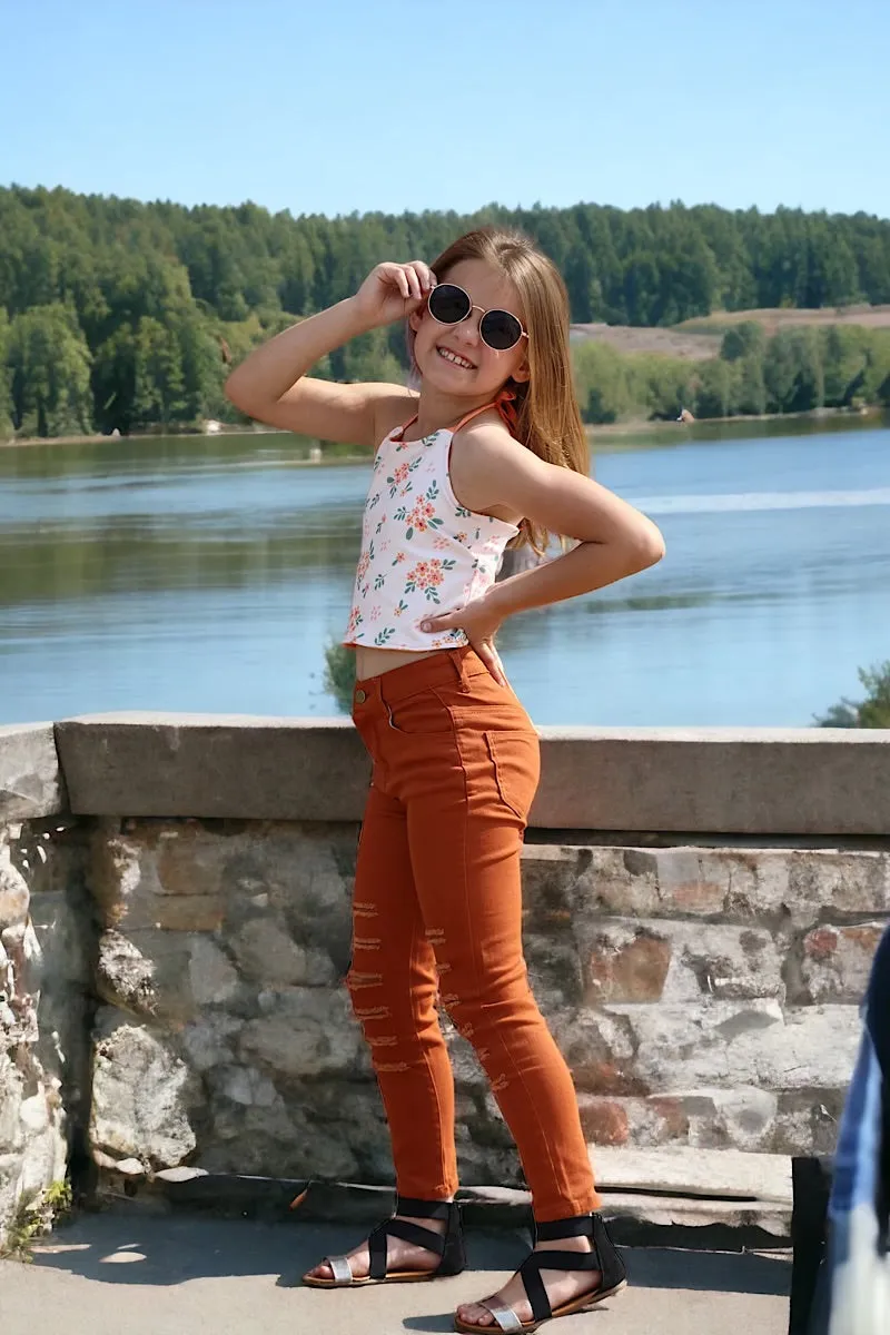 Rust ripped skinny jeans. PNG25133062-sol