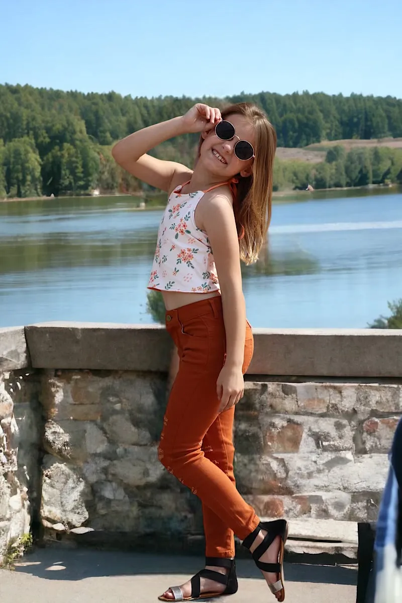 Rust ripped skinny jeans. PNG25133062-sol
